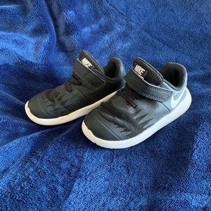 Boys Nikes running shoes size 6.5